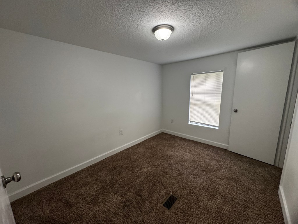 Lot 3 carpeted bedroom